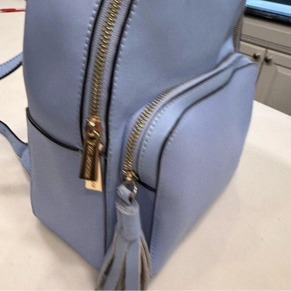 KC JAGGER Women’s Periwinkle Blue Leather Backpack, Front Zip Pocket Tassel